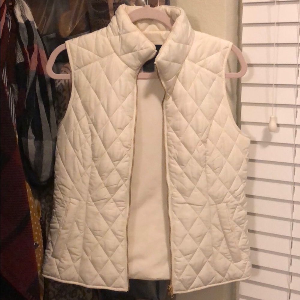 White puffer vest